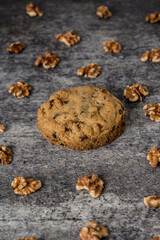 Homemade cookies with walnuts on a gray background