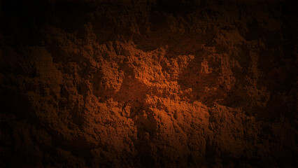 Dark stone texture with rich brown tones transitioning to black, featuring rugged details perfect for dramatic backgrounds and bold design elements