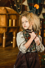 Little Girl Standing in Front of Christmas Tree