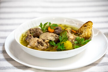 Super nutritious chicken and vegetable soup with chicken liver and hearts