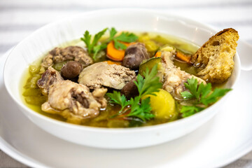 Super nutritious chicken and vegetable soup with chicken liver and hearts