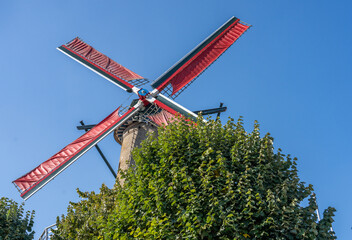 Old classic windmill on the Zeeuws West Vlaanderen island of the Netherlands