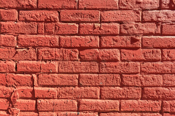 Head on view of a red brick wall.