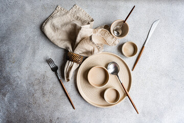 Rustic autumn table setting with neutral tones and textures
