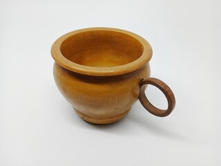 small wooden cup with handle