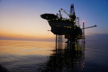 oil rig at sunset