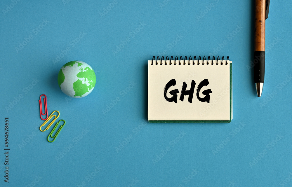 Poster there is notebook with the word ghg. it is an abbreviation for as eye-catching image.