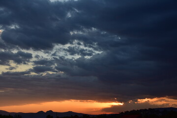 Fototapeta premium clouds over a sunset