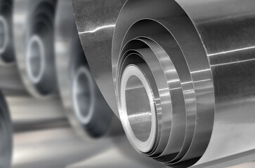 rolls of aluminum metal material with blur background. selective focus