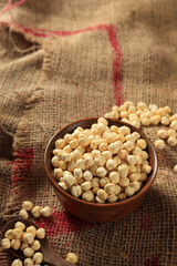 Raw Chickpeas in Wooden Bowl