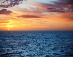 Obraz premium Beautiful sunset over the sea. Dramatic sky. Nature composition.