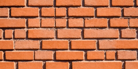 Obraz premium Background of cracked red bricks wall texture.
