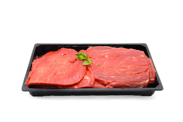 Fresh Raw Beef Steaks in Black Tray Isolated on White Background