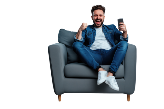Excited Man Celebrating Victory on Smartphone While Sitting on Comfortable Armchair - Isolated Transparent Background PNG