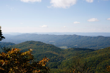 Expansive Mountain Range View Under A Clear Blue Sky
