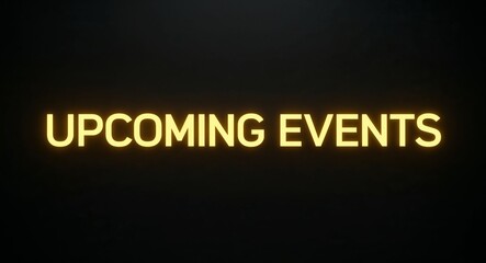 Obraz premium upcoming events word lettering with yellow glow on plain black dark background