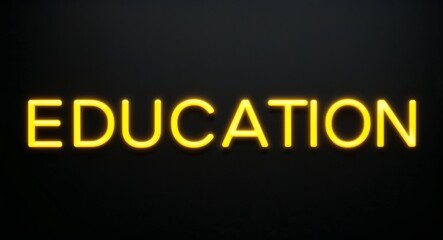 Obraz premium education word lettering with yellow glow on plain black dark background