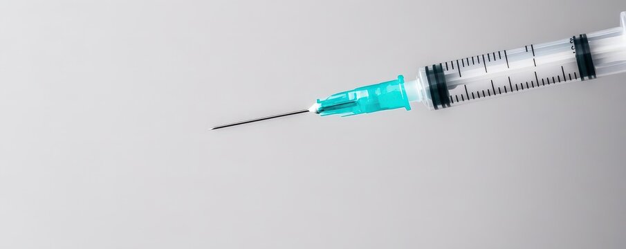 Macro shot of a needle piercing the skin, pain, medical injection discomfort
