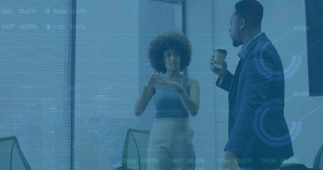 Image of diagrams and data processing over diverse colleagues discussing work