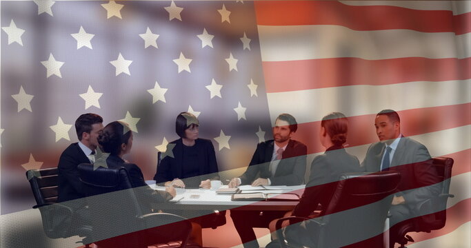 Image of flag of usa over diverse business people in office - Powered by Adobe