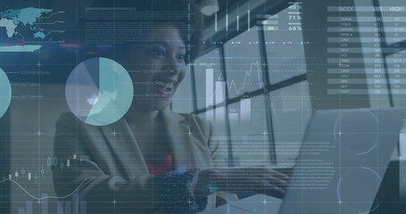 Image of financial data processing over african american businesswoman in office