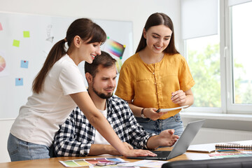 Group of designers working together in office