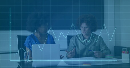 Image of financial data processing over diverse colleagues discussing work in office