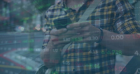 Image of financial data processing over caucasian man using smartphone in city