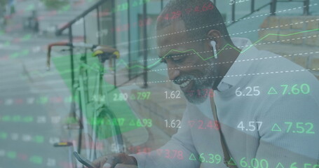 Image of financial data processing over african american man using smartphone in city