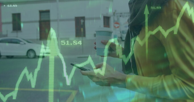 Image of financial data processing over biracial woman using smartphone in city