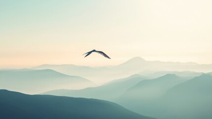 Naklejka premium A serene lake surrounded by mountains seen from above, emphasizing the peacefulness of flying.