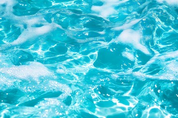 Obraz premium Close-Up of Aqua Water Surface with Gentle Bubbles and Reflections