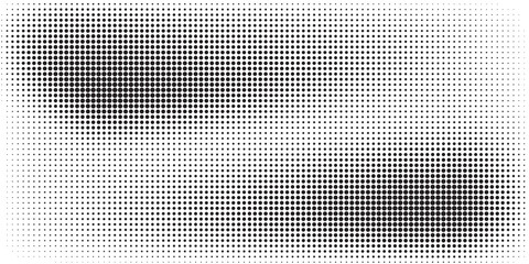 Abstract halftone dots texture background. Grunge black and white backdrop.