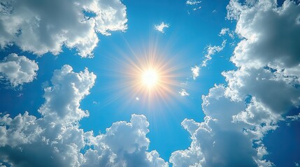 The sun shines through a blue sky with white clouds, embodying summer sunshine and a sunny cloudscape in the spring season.