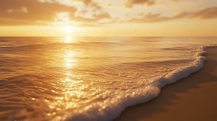 Obraz premium Golden beach at sunset, clear waves washing ashore