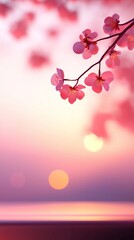 A delicate cherry blossom branch against a serene sunset, creating a tranquil and beautiful nature scene.