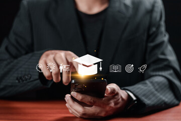 online education technology concept, Businessman using smartphone with e-learning education system, internet lessons and online webinar, AI-enhanced learning with personalized courses.