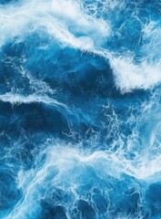 Fototapeta premium Vibrant Blue Ocean Waves with Frothy White Crests in Motion