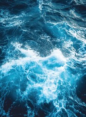 Obraz premium Dynamic Ocean Waves with Deep Blue and Frothy White Crests