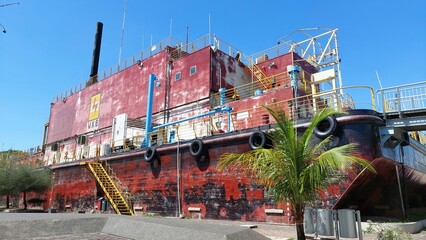Aceh Tsunami Museum in the form of a diesel ship in the middle of a residential area
