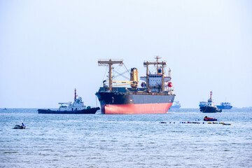 Naklejka premium oil transport ship at the port industry in export logistics and international shipping by containers