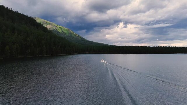 the boat sails on the Multinsky lake