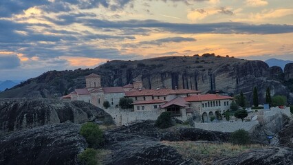 Fototapeta premium meteora churches in kalampaka city greece sunset time