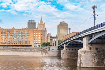 Fototapeta premium Borodinsky Bridge and Ministry of Foreign Affairs of Russia main building in Moscow. Russia