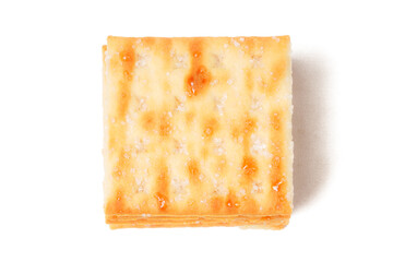 Sweet crispy cracker sprinkled with sugar on top, set against a clean white background. The golden brown crackers create a simple yet appetizing display