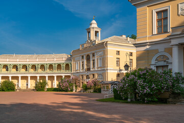 Fototapeta premium The Northern wing of the Summer Palace of Emperor Paul I in Pavlovsk on a sunny day, Pavlovsk, Saint Petersburg, Russia