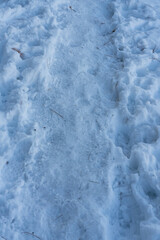 Foot path through snow.  Packed down. 