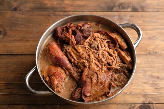 gudeg manggar. is a coconut flower vegetable cooked with coconut milk, brown sugar, coriander, and spices. Kampung Chicken. Yogyakarta cuisine. Indonesian food.