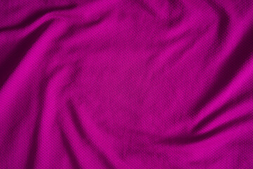 Close up of purple football jersey sports clothing fabric texture.