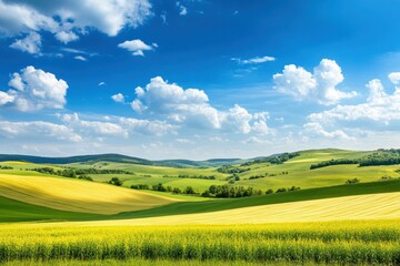 Fototapeta premium Scenic Countryside with Rolling Hills and Blue Sky